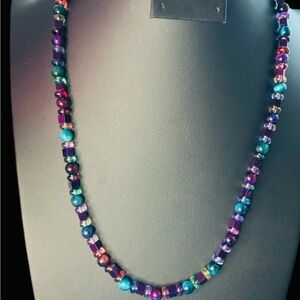 Rainbow of colors make this a unique piece.